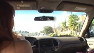 Three bombshells having fun in the car