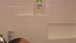 Cute Ally taking shower and shaving