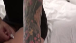 Tattooed German MILF Sophie Logan sucks a big dick