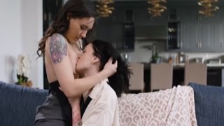 Tattooed waitress strapon fucked by milf