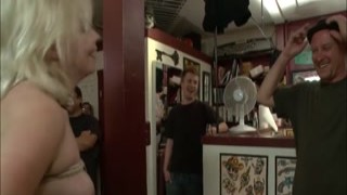 Slut deep throat banged in tattoo shop